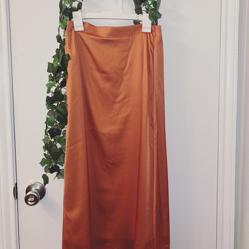 Silk & Satin Long pumpkin colored skirt. Never worn! In great condition. Size S